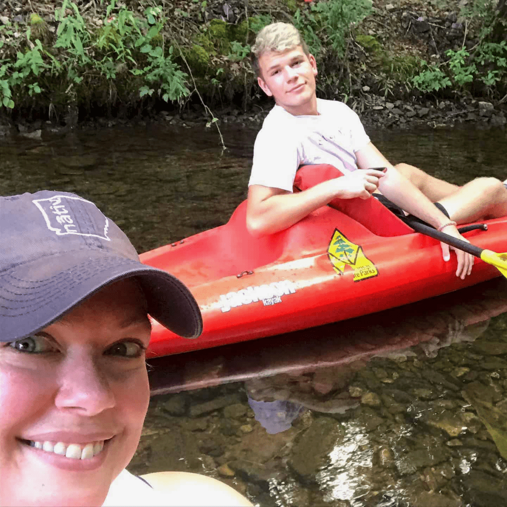 Rachel Hale kayaking with her brother