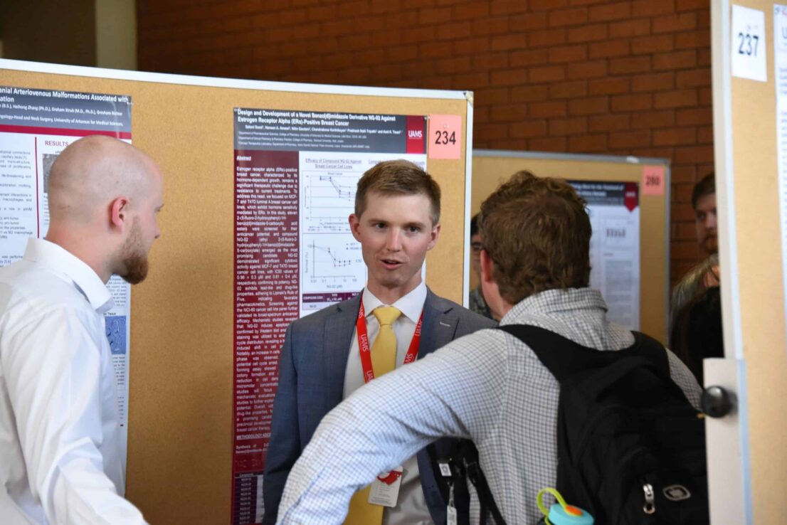 Students talking before posters
