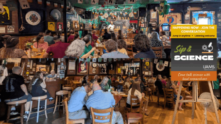 Community members gathered inside a restaurant for conversation and discussion