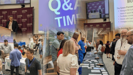 Attendees visiting different event tables