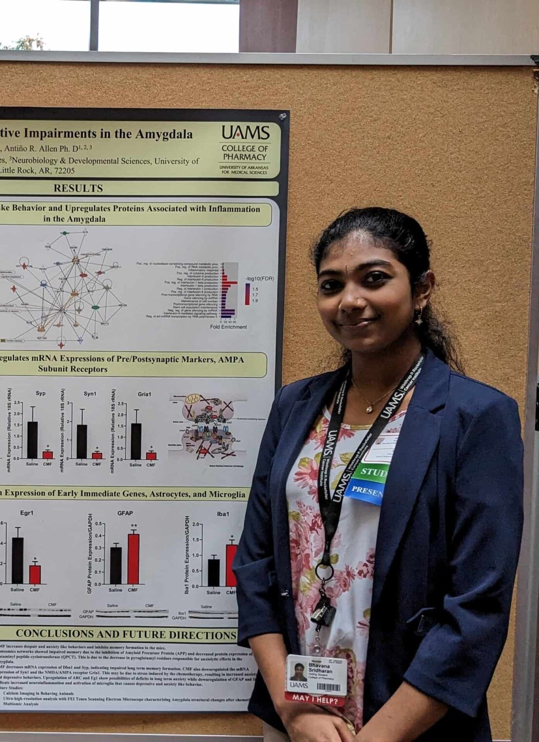 Summer student_Sreevatsav standing in front of her poster